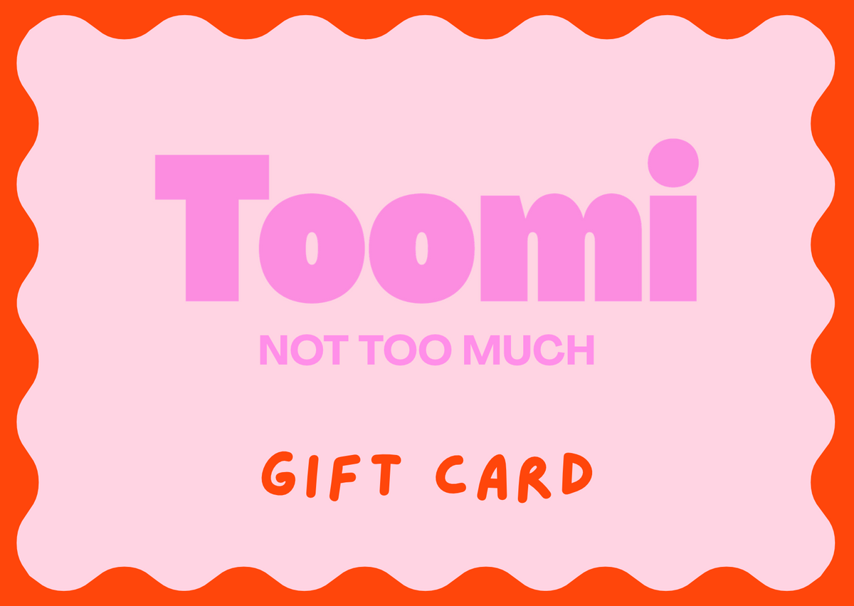 Toomi gift card, blush pink with a wavy orange border and the Toomi wordmark above the words not too much
